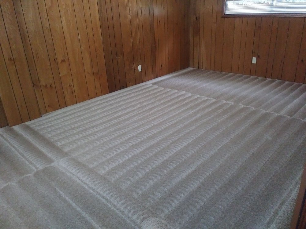 Room with cleaned carpets